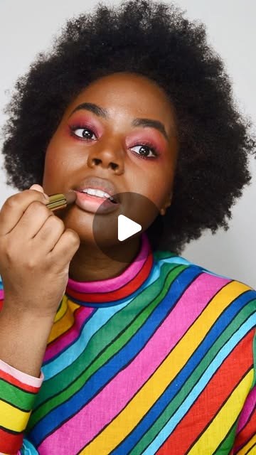 Marcelle Adrianna applying lipstick in a Gucci Beauty creator reel.